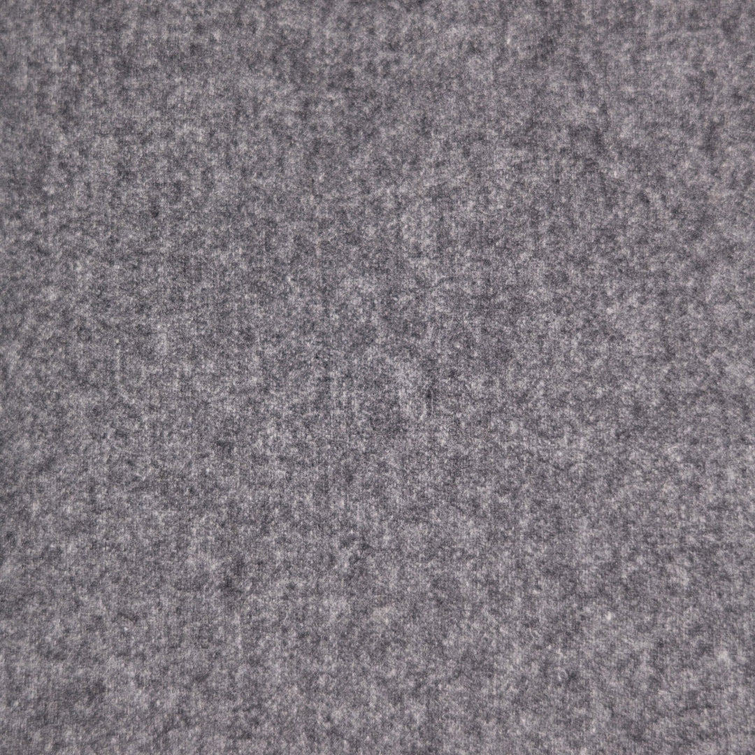 A close-up texture shot of a heathered gray felt or wool-like fabric surface.