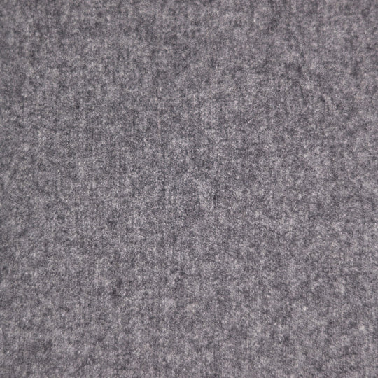 A close-up texture shot of a heathered gray felt or wool-like fabric surface.