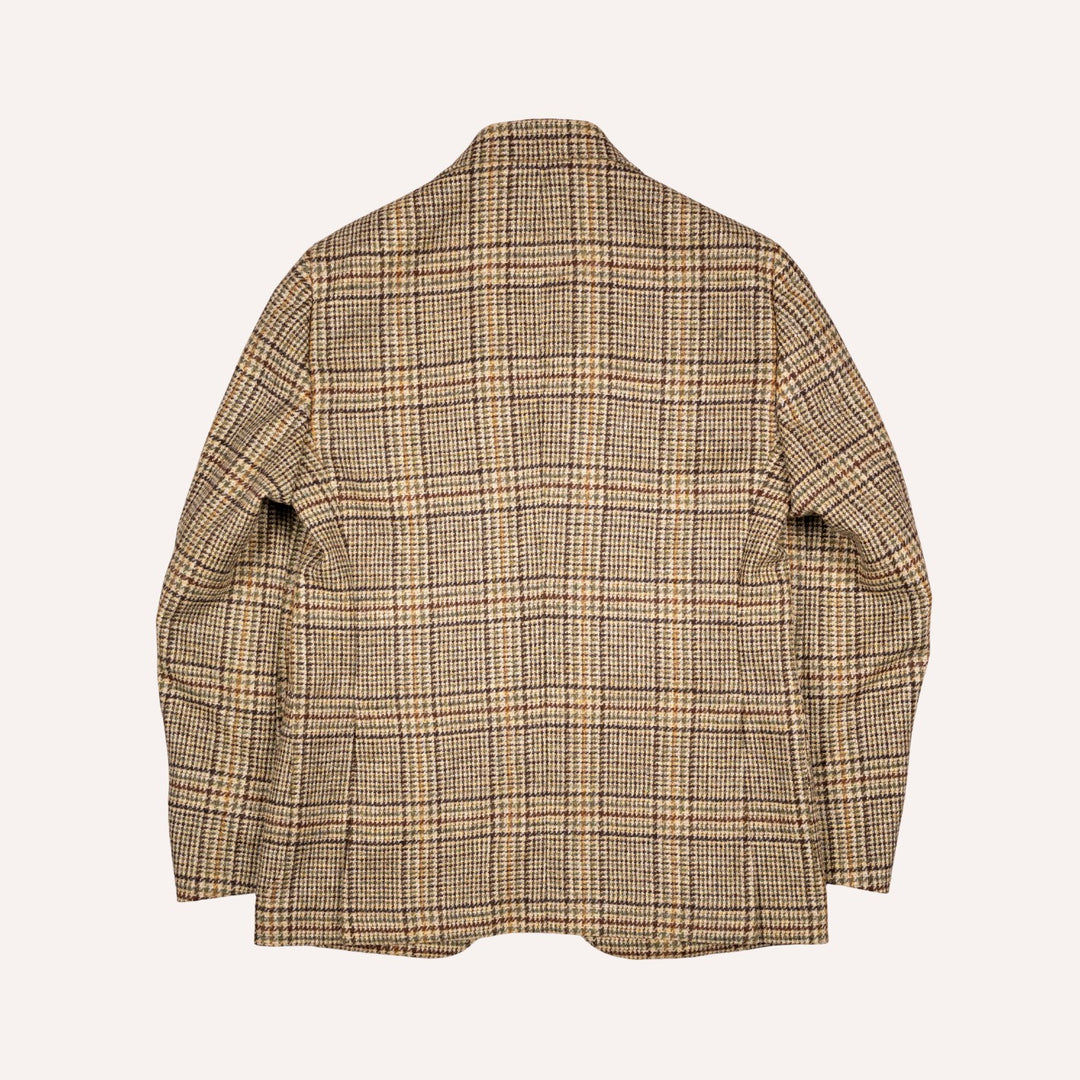 A long-sleeve plaid blazer shown from the back, featuring a classic checkered pattern in beige, brown, and black on a light cream background.