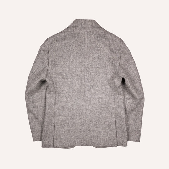 The back view of a light gray textured blazer, displayed flat against a solid off-white background.