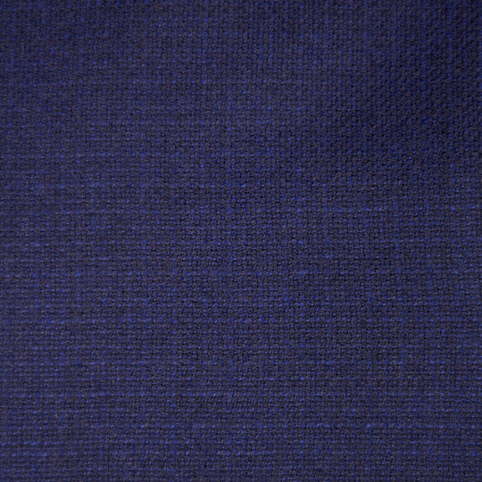 A close-up of a dark navy blue textured fabric with a fine woven pattern.