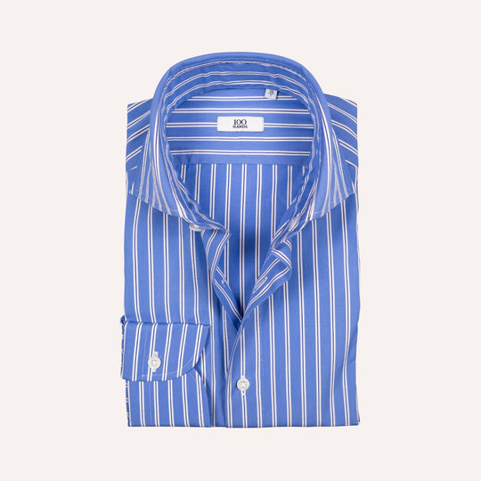 A folded blue and white vertically striped dress shirt with a spread collar and a visible neck label reading '100 Hands'.