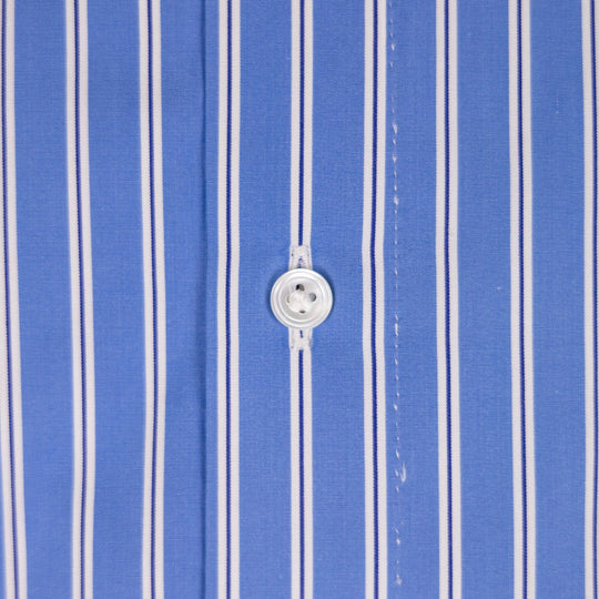 Close-up of a blue and white vertically striped shirt fabric with a white button at the center.