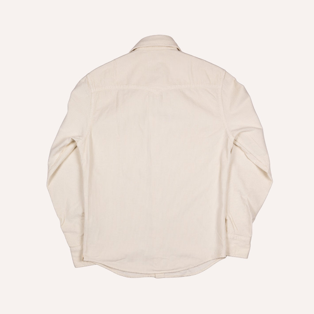 A light beige long-sleeve corduroy western shirt shown from the back, laid flat against a solid off-white background.